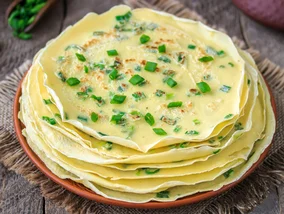 Miniatura: Do ciasta wsypuję pół pęczka. Te naleśniki...