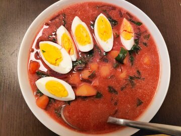 022 Polish cuisine, soup in Poland - botwinka soup made from beetroot leaves and root vegetables, served with egg